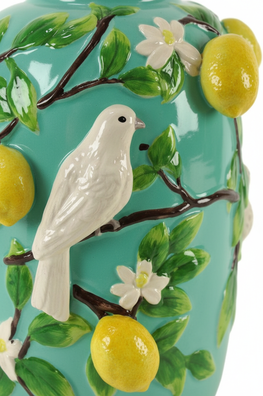 Detalhe dos limões e pássaro em relevo